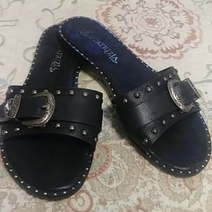 Patrizia slip on sandals.